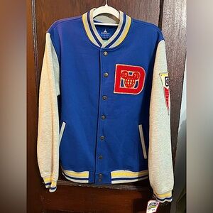 Medium Disney varsity jacket in blue and grey.